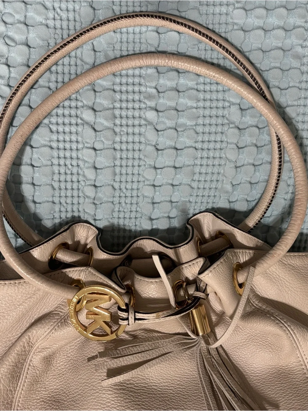 Michael Kors Cream Leather Drawstring Shoulder Bag with Tassel and Gold Hardware